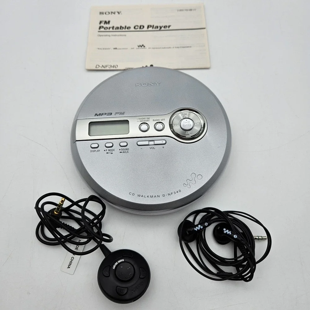 Sony D-NF340 CD Walkman MP3 FM Digital Tuner 30H w/ Headset Remote Manual WORKS!